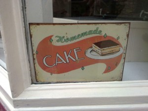 sign in shop window - home made cake