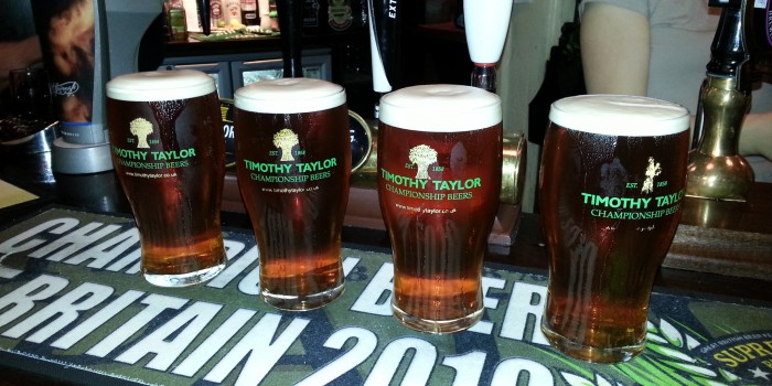 4 pints of Timothy Taylors Landlord poured at the Strugglers Inn in Lincoln
