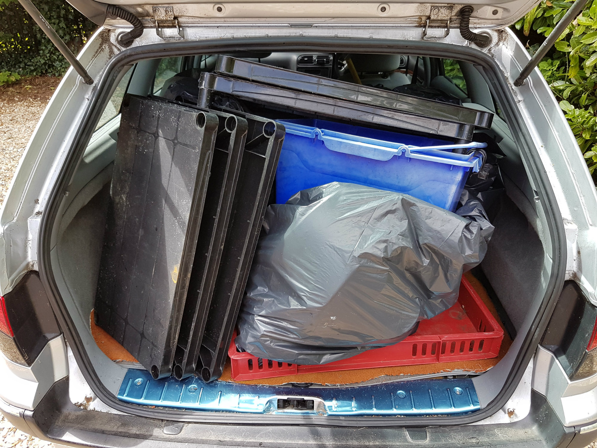 A car full of rubbish where art collides